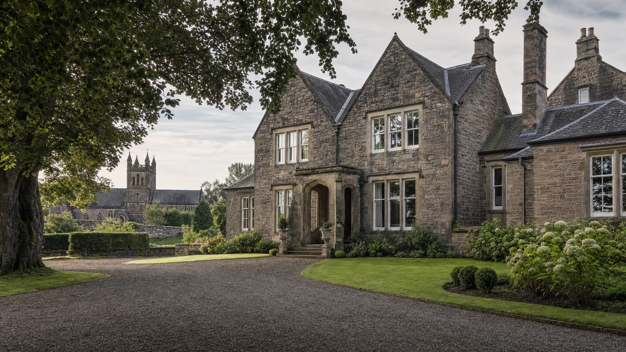 Removals from London to Dunblane: A substantial stone family home near Dunblane Cathedral, mature trees